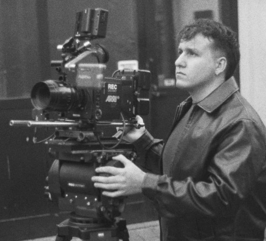 Simone Montalbano behind an ARRI camera on set